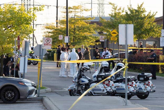 September 12, 2022, Mississauga, ON, CANADA: Police vehicles and officers are seen behind tape at a scene in Mississauga, Ont., Monday, Sept. 12, 2022. A Toronto police officer has been fatally shot and a suspect is in custody after two separate shootings left two dead and three injured in the Greater Toronto Area on Monday afternoon. Mississauga CANADA  - ZUMAc35_ 20220912_zaf_c35_172 Copyright: xArlynxMcadoreyx
