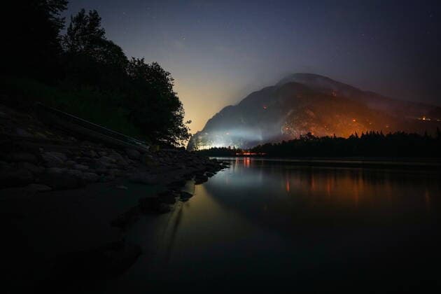 September 12, 2022, HOPE, BC, CANADA: The Flood Falls Trail wildfire burns above the Fraser River in Hope, B.C., Monday, Sept. 12, 2022. HOPE CANADA  - ZUMAc35_ 20220912_zaf_c35_218 Copyright: xDarrylxDyckx