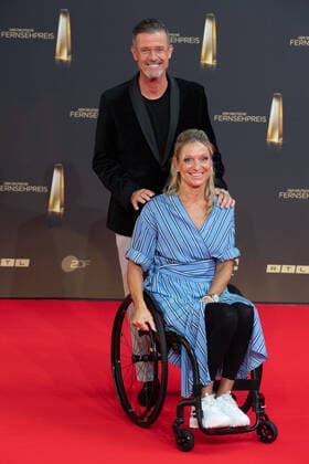 Michael ANTWERPES, presenter, Kirsten BRUHN, Para swimmer, red carpet, red carpet show, arrival, arrival, German Television Award, German Television Award 2022, German Television Award 2022 in Cologne, on 14 09 2022