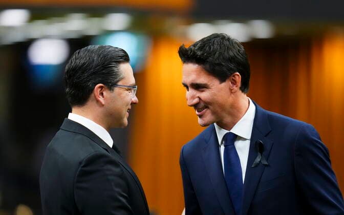 September 15, 2022, Ottawa, ON, CAN: Prime Minister Justin Trudeau and Conservative leader Pierre Poilievre greet each other as they gather in the House of Commons on Parliament Hill to pay tribute to Queen Elizabeth in Ottawa on Thursday, Sept. 15, 2022. Ottawa CAN  - ZUMAc35_ 20220915_zaf_c35_002 Copyright: xSeanxKilpatrickx