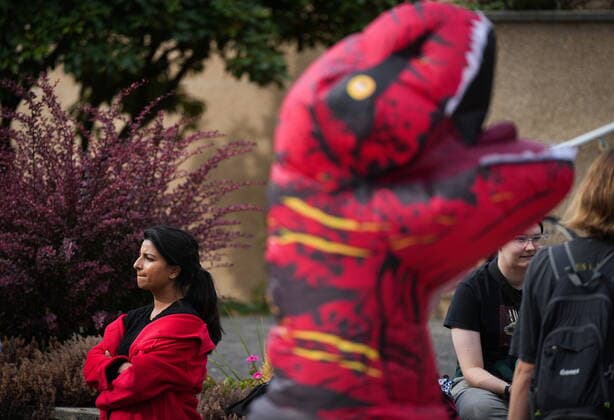 September 17, 2022, BURNABY, BC, CANADA: B.C. NDP leadership candidate Anjali Appadurai attends a protest against the Trans Mountain pipeline and a rally calling for the protection of Stoney Creek, while a person wears a dinosaur costume in Burnaby, B.C., on Saturday, September 17, 2022. BURNABY CANADA  - ZUMAc35_ 20220917_zaf_c35_097 Copyright: xDarrylxDyckx