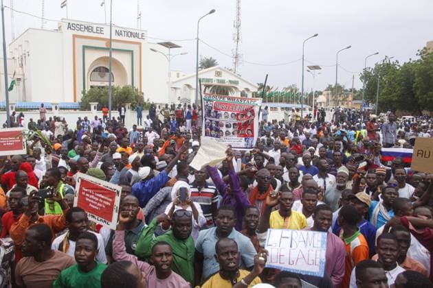 Nigerien demonstrators hold up anti-French placards during a protest march against the high cost of living and the presence of the French army in Niger at the initiative of the Pan-African Network for Peace, Democracy and Progress (Reppad), 18 September 2022 in Niamey. Photo:xSouleyxAbdoulaye Afrikimages 1054_48_MDCN014
