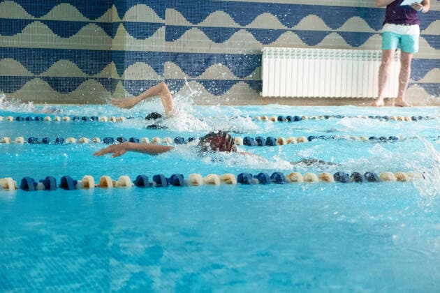 Children swimming freestyle. Indoor swimming pool with clear blue water. , 27904752.jpg, swimming, child, swim, freestyle, race, boy, kid, swimmer, pool, kids, people, summer, water, exercise, sport, competition, crawl, athlete, action, fitness, splash, team, laps, girl, youth, health, male, lifestyle, children, season, young, lanes, workout, motion, aquatics, fit, speed, compete, performance, movement, summertime, stroke, kick, athletics, meet, blue, red, female, person, caucasian,