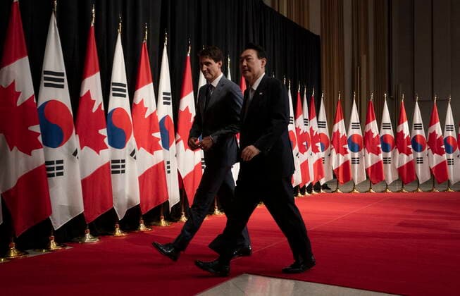 September 23, 2022, Ottawa, ON, Canada: Canadian Prime Minister Justin Trudeau and South Korean President Yoon Suk Yeol leave a joint news conference, Friday, September 23, 2022 in Ottawa. Ottawa Canada  - ZUMAc35_ 20220923_zaf_c35_099 Copyright: xAdrianxWyldx