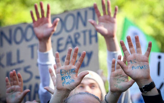 September 23, 2022, Montreal, Quebec, Canada: Thousands of protesters gathered for a climate march, demanding more action on climate change from elected officials. The event was part of the Fridays for Future Movement, an international, youth-led initiative inspired by Swedish activist Greta Thunberg. Some protesters showed their hands where the following quote was written: The future is in our hands. Montreal Canada - ZUMAs278 20220923_zip_s278_008 Copyright: xSerkanxSenturkx
