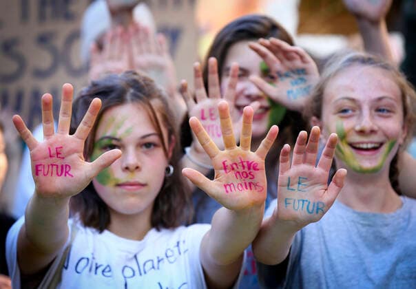 September 23, 2022, Montreal, Quebec, Canada: Thousands of protesters gathered for a climate march, demanding more action on climate change from elected officials. The event was part of the Fridays for Future Movement, an international, youth-led initiative inspired by Swedish activist Greta Thunberg. Some protesters showed their hands where the following quote was written: The future is in our hands. Montreal Canada - ZUMAs278 20220923_zip_s278_018 Copyright: xSerkanxSenturkx