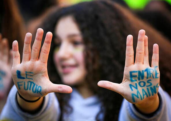 September 23, 2022, Montreal, Quebec, Canada: Thousands of protesters gathered for a climate march, demanding more action on climate change from elected officials. The event was part of the Fridays for Future Movement, an international, youth-led initiative inspired by Swedish activist Greta Thunberg. Some protesters showed their hands where the following quote was written: The future is in our hands. Montreal Canada - ZUMAs278 20220923_zip_s278_024 Copyright: xSerkanxSenturkx