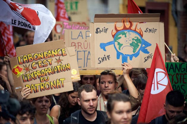 Youth For Climate Demonstrate In Toulouse A young woman holds a placard reading Profusion is CEOs expropriattion . Following the call of Greta Thunberg for a World School Strike and Fridays for future , school students and students took to the streets of Toulouse to denounce the governments inaction towards the climate crisis even after the 6th IPCC assement report. The window to keep the temperature under +1.5Â°C is rapidly closing as precised in the IPCC report. They also denounce the lack of action against the environment crisis by governments just before the Cop27. Demonstrations were planned in more than 3,100 locations all over the world. Toulouse. France. September 23th 2022. Toulouse France  Copyright: xAlainxPittonx originalFilename: pitton-notitle220923_npkA3.jpg