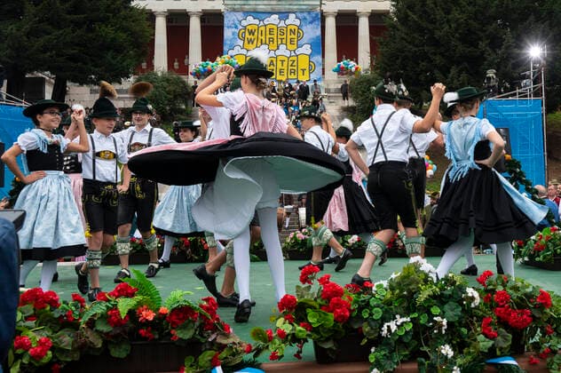 Munich, at the 187 Oktoberfest on the Theresienwiese, below the Bavaria the Wiesn Wirte Platzkonzert takes place, members of the Trachtenverein from Marquartstein and the Chiemgau are dancing