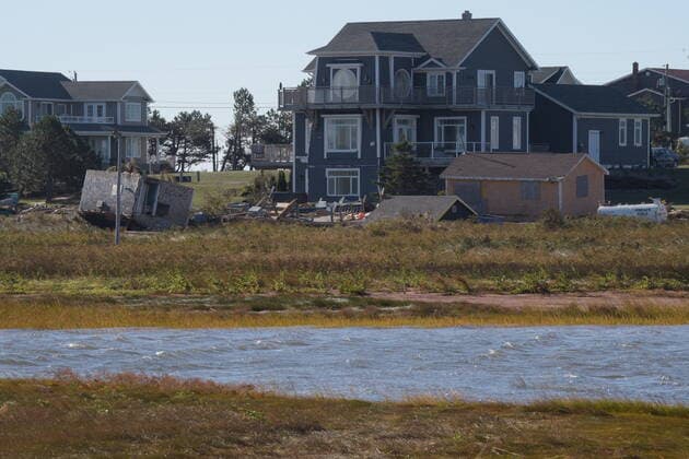 September 25, 2022, Covehead, PEI, Canada: Three fishing sheds are in the backyard of a home in Covehead, P.E.I. on Sunday, September 25, 2022. After hammering Atlantic Canada, post-tropical storm Fiona has moved inland in southeastern Quebec, with Environment Canada saying the storm will continue to weaken as it tracks across southeastern Labrador and over the Labrador Sea. Covehead Canada  - ZUMAc35_ 20220925_zaf_c35_098 Copyright: xBrianxMcinnisx
