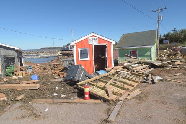 September 25, 2022, Stanley Bridge, PEI, Canada: The wharf is damaged at Stanley Bridge, P.E.I. on Sunday, September 25, 2022. After hammering Atlantic Canada, post-tropical storm Fiona has moved inland in southeastern Quebec, with Environment Canada saying the storm will continue to weaken as it tracks across southeastern Labrador and over the Labrador Sea. Stanley Bridge Canada  - ZUMAc35_ 20220925_zaf_c35_100 Copyright: xBrianxMcinnisx