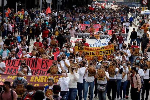 September 26, 2022, Mexico City, Mexico: Persons take part during the demonstration to demnad justice for the crime as part of the 8th anniversary of the forced disappearance of the 43 normalistas of Ayotzinapa Zocalo in Mexico City. on September 26, 2022 in Mexico City, Mexico. Mexico City Mexico - ZUMAe321 20220926_zia_e321_056 Copyright: xLuisxBarronxEyepixxGroupx