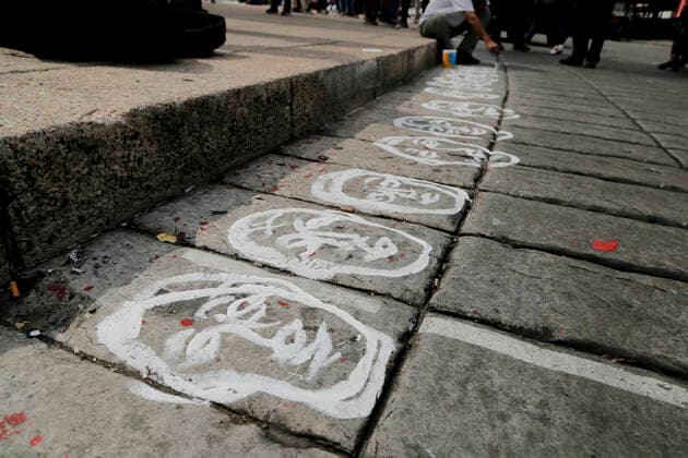 September 26, 2022, Mexico, Mexico: Faces of the missing students were painted on the ground during a demonstration to commemorate the 8th anniversary of the disappearance of the 43 Ayotzinapa students. On the night of September 26, 2014, 43 students from the Raoel Isidro Burgos Rural Normal School located in Iguala, Guerrero, were victims of forced disappearance by members of public security from the state of Guerrero and federal military security..The students had allegedly tried to hijack trucks to use for their protests. Mexico Mexico - ZUMAs197 20220926_zaa_s197_303 Copyright: xGuillermoxDiazx