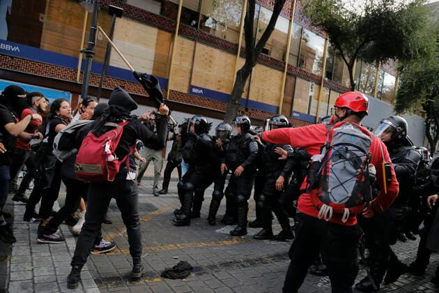 September 26, 2022, Mexico, Mexico: Protesters clash with police officers during a demonstration to commemorate the 8th anniversary of the disappearance of the 43 Ayotzinapa students. On the night of September 26, 2014, 43 students from the Raoel Isidro Burgos Rural Normal School located in Iguala, Guerrero, were victims of forced disappearance by members of public security from the state of Guerrero and federal military security..The students had allegedly tried to hijack trucks to use for their protests. Mexico Mexico - ZUMAs197 20220926_zaa_s197_327 Copyright: xGuillermoxDiazx