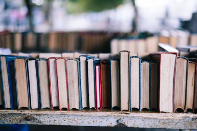 Books in row on shelf, AMWF00368