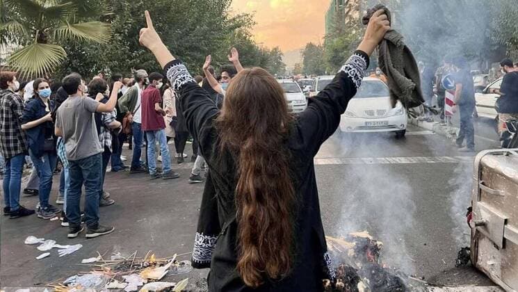 Sep 28, 2022 - Tehran, Tehran, Iran - This photo shows that Iranian women are on the front line of the protests and are fighting against the agents of repression. Mahsa Amini, a 22-year-old Iranian woman, was arrested in Tehran on 13 September by the morality police, a unit responsible for enforcing Iran s strict dress code for women. She fell into a coma while in police custody and was declared dead on 16 September, with the authorities saying she died of heart failure while her family advised that she had no prior health conditions. Her death has triggered protests in various areas in Iran and around the world. According to Iran s state news agency IRNA, Iranian President Ebrahim Raisi expressed his sympathy to the family of Amini on a ph - ZUMAi98_ 20220928_new_i98_477 Copyright: xSocialxMediax