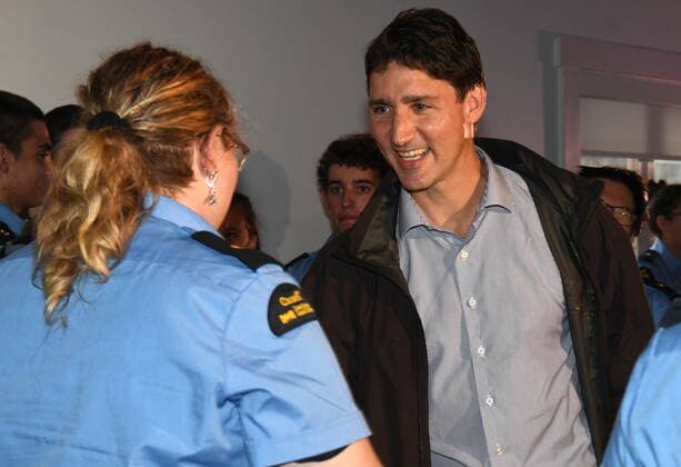 September 27, 2022, Sydney, NS, Canada: Prime Minister Justin Trudeau greets Sophia Ryan a cadet at the Canadian Coast Guard College as he inspects the extensive damage caused by post-tropical storm Fiona in Sydney, N.S. on Tuesday, September 27, 2022. Sydney Canada  - ZUMAc35_ 20220927_zaf_c35_135 Copyright: xVaughanxMerchantx