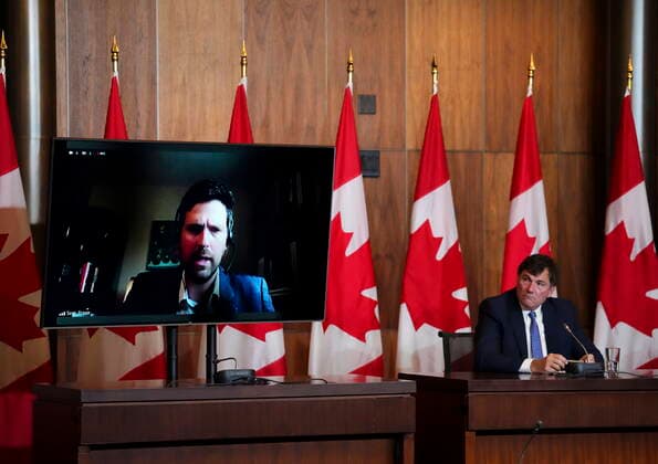 September 28, 2022, Ottawa, ON, CAN: Minister of Intergovernmental Affairs, Infrastructure and Communities Dominic LeBlanc listens in as Minister of Immigration, Refugees and Citizenship Sean Fraser speaks virtually on a monitors during a press conference on the damage caused by hurricane Fiona, in Ottawa on Wednesday, Sept. 28, 2022. Ottawa CAN  - ZUMAc35_ 20220928_zaf_c35_009 Copyright: xSeanxKilpatrickx