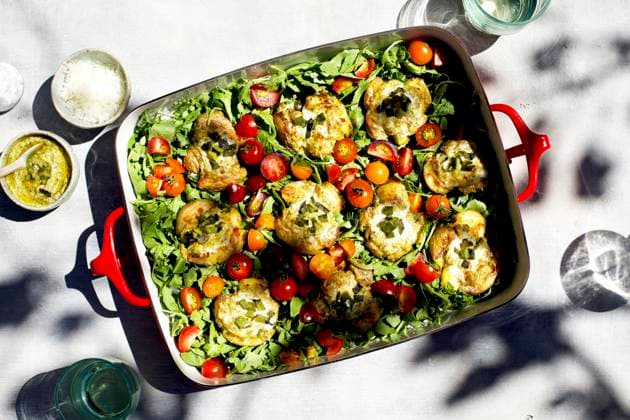 Roasted Poblano Pesto Smashed Potatoes served on a bed of arugula and cherry tomatoes Roasted Poblano Pesto Smashed Potatoes served on a bed of arugula and cherry tomatoes Copyright: xStephaniexMcKinniex SMC111119-4