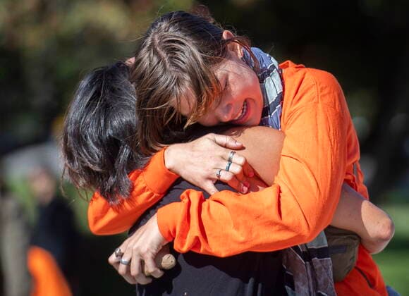 September 30, 2022, Montreal, PQ, Canada: People hug as they take part in an event to mark National Day for Truth and Reconciliation in Montreal, Friday, September 30, 2022. Montreal Canada  - ZUMAc35_ 20220930_zaf_c35_082 Copyright: xGrahamxHughesx
