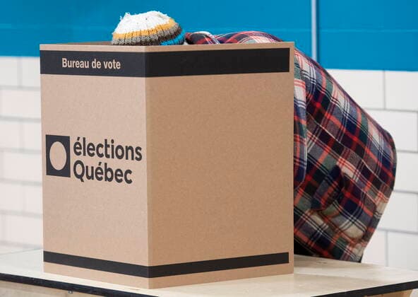 October 3, 2022, Montreal, PQ, Canada: A person votes on Quebec provincial election day in Montreal, Monday, October 3, 2022. Montreal Canada  - ZUMAc35_ 20221003_zaf_c35_025 Copyright: xGrahamxHughesx