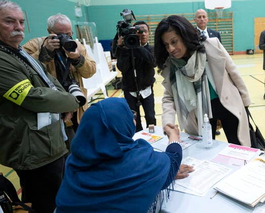 October 3, 2022, Montreal, PQ, Canada: Quebec Liberal leader Dominique Anglade shakes hands with an election workers after casting her ballot in the provincial election Monday, Oct 3, 2022 in Montreal. Montreal Canada  - ZUMAc35_ 20221003_zaf_c35_029 Copyright: xRyanxRemiorzx