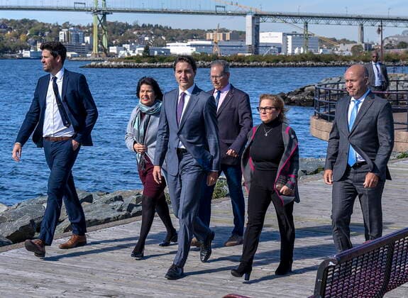 October 4, 2022, Dartmouth, NS, Canada: Prime Minister Justin Trudeau, centre, accompanied by regional MPs Sean Fraser, left to right, Ginette Petitpas Taylor, Darren Fisher, Lena Metlege Diab and Andy Fillmore heads to make an announcement about funds for victims of post-tropical storm Fiona in Dartmouth, N.S. on Tuesday, Oct. 4, 2022. Dartmouth Canada  - ZUMAc35_ 20221004_zaf_c35_037 Copyright: xAndrewxVaughanx