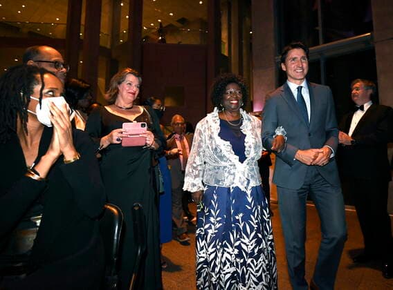 October 5, 2022, Ottawa, ON, CAN: Prime Minister Justin Trudeau walks with Jean Augustine, who became the first Black female Member of Parliament in 1993 and the first Black woman in Cabinet in 2002, as they arrive to make remarks after the premiere of Steadfast, a film about Augustine s life, at the National Gallery of Canada in Ottawa, on Wednesday, Oct. 5, 2022. Ottawa CAN  - ZUMAc35_ 20221005_zaf_c35_050 Copyright: xJustinxTangx
