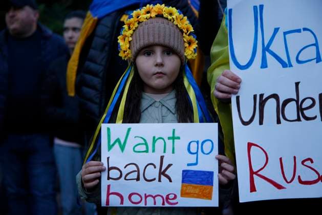 Ukrainians Call For Russia To Be Designated Terrorist State A young girl holds a sign during a rally in front of the Russian Embassy in Warsaw, Poland on 10 October, 2022. Several hundred people rallied in front of the Russian embassy in Warsaw on Monday calling for Russia to be designated a terrorist state and its diplomats to be expelled after missile strikes in Ukraine killed 11 people in multiple cities. Warsaw Poland  Copyright: xSTRx originalFilename: arriens-ukrainia221010_npm5o.jpg