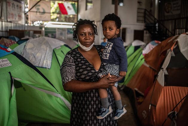 October 11, 2022: A Haitian mother carries her young son John, who is ill due to poor hygienic conditions - ZUMAqp1_ 20221011_zip_qp1_015 Copyright: xHectorxAdolfoxQuintanarxPerezx