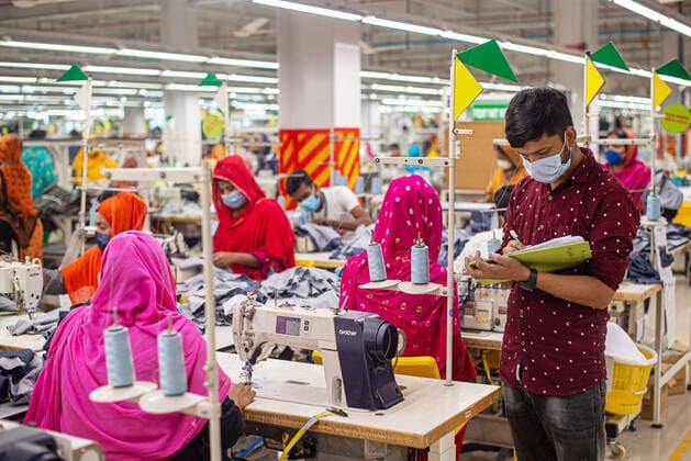 October 12, 2022, Gazipur, Dhaka, Bangladesh: Workers make clothes at a Garment factory in Gazipur, Bangladesh. Four out of five of the 4.4 million workers employed in the garment industry in Bangladesh are women. The ready-made garment (RMG) industry is a mainstay of this economic success story. Bangladesh is today one of the world s largest garment exporters, with the RMG sector accounting for 84 % of Bangladesh s exports. Bangladesh is the second largest individual country for apparel manufacturing in the world behind China and is where brands like H&M, Target and Marks and Spencer produce much of their goods. Bangladesh s export earnings crossed the milestone of $50 billion with Apparel sector being the highest earners of the export rec - ZUMAs231 20221012_zip_s231_052 Copyright: xJoyxSahax