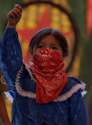 530 Years Of Resistance By Indigenous Peoples And Communities To The Arrival Of Europeans In The Americas A girl from the Otomi indigenous community raises her fist during the Global Forum and Action against militarisation in Mexico and the 530 years of resistance of indigenous peoples and communities to the arrival of Europeans in America, an event held at the Casa de los Pueblos y Comunidades Indigenas in Mexico City. Mexico City Mexico  Copyright: xGerardoxVieyrax originalFilename: vieyra-notitle221012_npStj.jpg