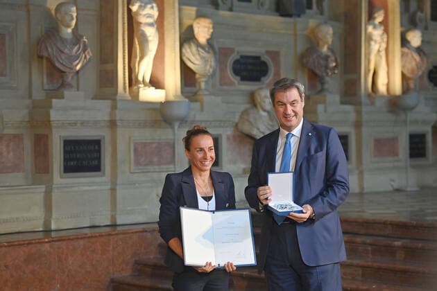 Anne HAUG Triathlete receives the Bavarian Order of Merit from Markus SOEDER State Premier of Bavaria and CSU Chairman Award of the Bavarian Order of Merit in the Antiquarium of the Munich Residence on 13 10 2022