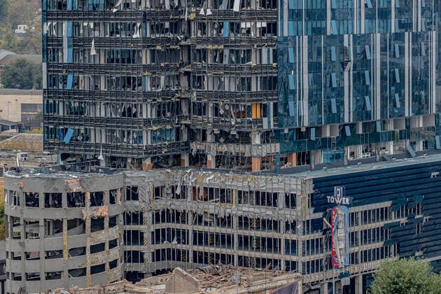 Windows and facade remain ripped apart while part of the rubble is cleared from the 101 Tower, in a parallel shot 3 days after Russian forces struck the capital Kyiv, Ukraine, photographed on Thursday, Oct 13, 2022. Blasts rock capital Kyiv and other cities, in what Ukraine says, an attack to wipe us off the face of the earth. (VX Photo Vudi Xhymshiti), Russian Missile Hit Kyiv Kyiv 101 Tower Kyiv Region Ukraine  , Copyright: xVudixXhymshitix
