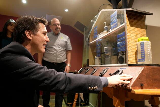 October 14, 2022, Kitchener, ON, CANADA: Prime Minister Justin Trudeau looks at a model home during a tour of Reep Green Solutions in Kitchener, Ont., Friday, Oct. 14, 2022. Kitchener CANADA  - ZUMAc35_ 20221014_zaf_c35_050 Copyright: xFrankxGunnx