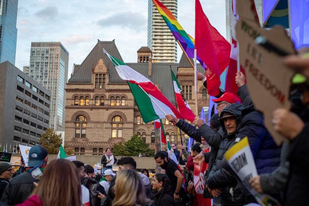 Iranian Anti-government Protest Hundreds of Iranian and their supporters demonstrate against the Iranian Islamic regime during a protest at Nathan Phillips Square in Toronto, Ontario, October 15, 2022. - Many Iranian people around the world have been protesting Islamic regime since the death of Mahsa Amini, a 22-year-old Kurdish who had spent three days in a coma after being detained by the morality police. Toronto Canada  Copyright: xArifxBalkanx originalFilename: balkan-notitle221015_npRYZ.jpg