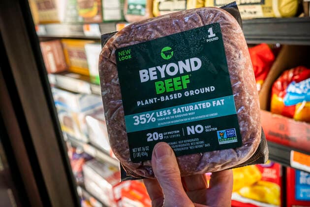 Beyond Meat in the supermarket A discerning shopper chooses a package of Beyond Meat™s ground beef from a freezer in a supermarket in New York on Friday, October 14, 2022. . (  RichardxB.xLevine
