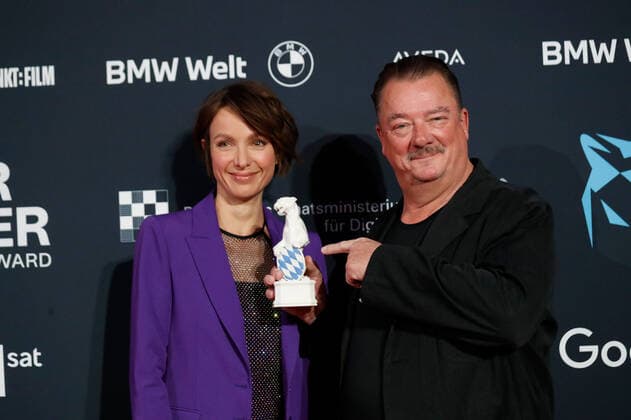 Blue Panther TV Streaming Award ceremony in Munich Laudator Julia Koschitz and award winner Peter Kurth at the Blue Panther Bavarian Television Award ceremony at the BMW Welt in Munich. Copyright: xEventpressxGolejewskix