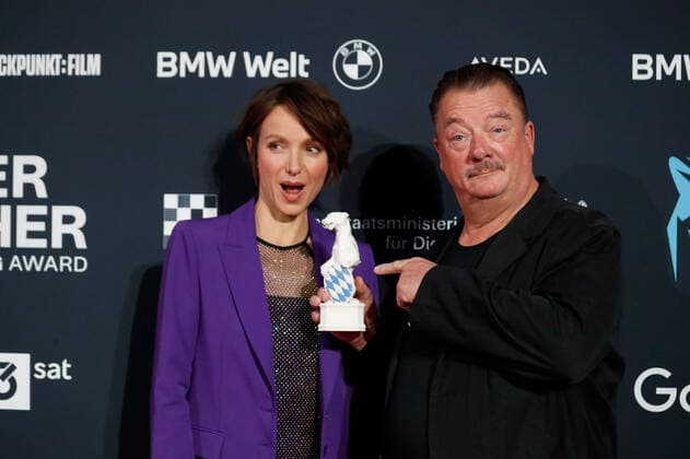 Blue Panther TV Streaming Award ceremony in Munich Laudator Julia Koschitz and award winner Peter Kurth at the Blue Panther Bavarian Television Award ceremony at the BMW Welt in Munich. Copyright: xEventpressxGolejewskix