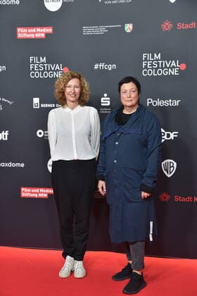 Director Nana Neul and Festival Director Martina Richter , l r, arrives to award Manfred Stelzer Prize to daughters of director Nana Neul at 32 Film Festival Cologne formerly Cologne Conference 2022 , an international film festival.