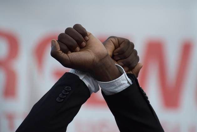 No Italy-Libya Memorandum A former migrant crosses his wrists, a gesture of protest by migrants held prisoner in Libya, during the demonstration against the renewal of the Italy-Libya Memorandum. An agreement that the Italian state has signed with Libya and which provides economic aid and technical support to the Libyan authorities from Italy, in an attempt to reduce the smuggling of migrants across the Mediterranean Sea. Rome Italy Copyright: xVincenzoxNuzzolesex vnuzzolese_roma_26_10_2022_16