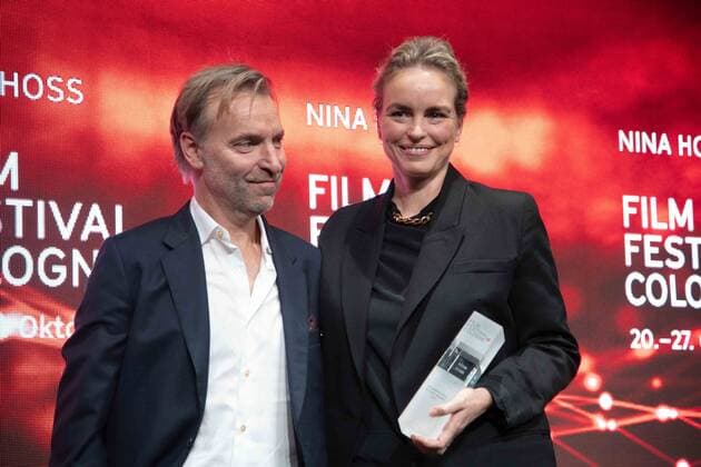 Actress Nina HOSS receives the International Actors Award, left laudator Mans MARLIND, director, Film Festival Cologne awards in Cologne, 27 10 2022