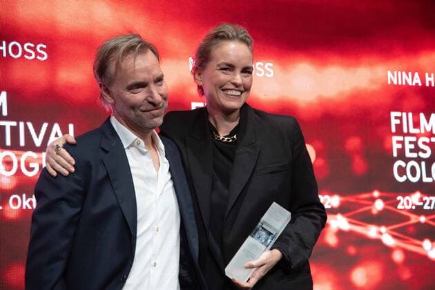 Actress Nina HOSS receives the International Actors Award, left laudator Mans MARLIND, director, Film Festival Cologne awards in Cologne, 27 10 2022