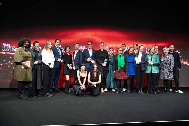 Closing photo with all award winners, Film Festival Cologne awards in Cologne, 27 10 2022
