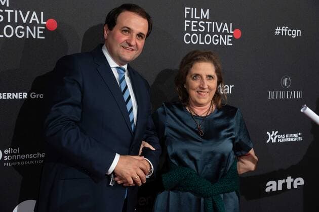 f l Nathanael LIMINSKI, Head of State Chancellery NRW, Petra MUELLER, Müller, Head of Filmstiftung NRW, Red Carpet, Red Carpet Show, arrival, arrival, Film Festival Cologne awards in Koeln, 27 10 2022