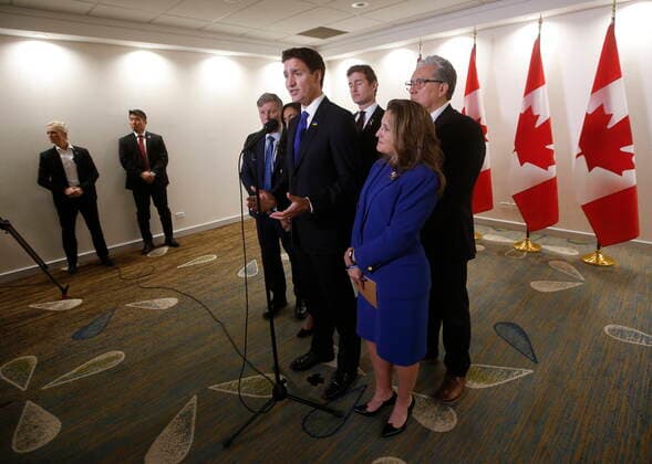October 28, 2022, WINNIPEG, MB, CANADA: Prime Minister Justin Trudeau is photographed with some of his MPs after attending and speaking at the opening ceremony of the Triennial Congress of Ukrainian Canadians at the Delta hotel in Winnipeg, Friday, Oct. 28, 2022. WINNIPEG CANADA  - ZUMAc35_ 20221028_zaf_c35_071 Copyright: xJohnxWoodsx