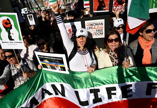 October 29, 2022, Ottawa, ON, CAN: Members of the Iranian Canadian community and their supporters chant before participating in a worldwide human chain organized by the Association of Families of Flight PS752 Victims in solidarity with antigovernment protesters in Iran, in Ottawa on Saturday, Oct. 29, 2022. Ottawa CAN  - ZUMAc35_ 20221029_zaf_c35_076 Copyright: xJustinxTangx
