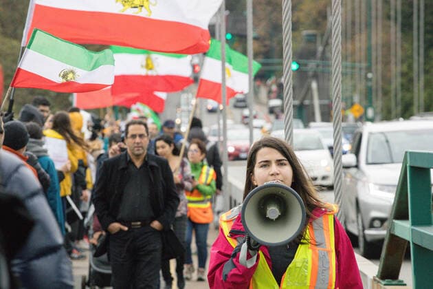 October 29, 2022, Vancouver, British Columbia, Canada: A person leads a chant during a protest in Vancouver, British Columbia...The protest brought people together on the Lions Gate Bridge to form a human chain protesting the current Iranian government. Vancouver Canada - ZUMAw171 20221029_znp_w171_011 Copyright: xRyanxWalterxWagnerx