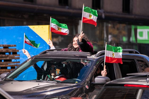 October 29, 2022, Toronto, Canada: People gather along Yonge street in protest against the Iranian government. Toronto Canada  - ZUMA 20221029_mda_m228_258 Copyright: xMichaelxChisholmx