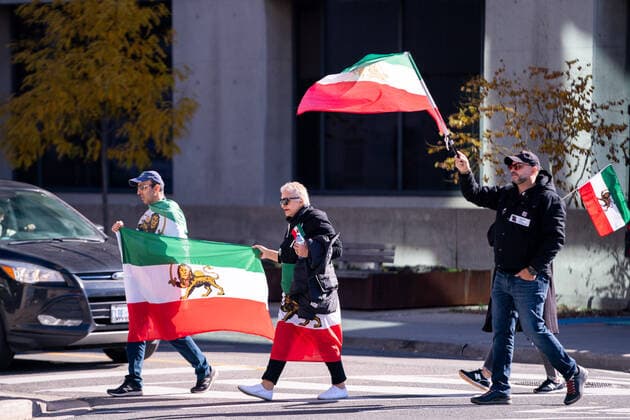 October 29, 2022, Toronto, Canada: People gather along Yonge street in protest against the Iranian government. Toronto Canada  - ZUMA 20221029_mda_m228_263 Copyright: xMichaelxChisholmx